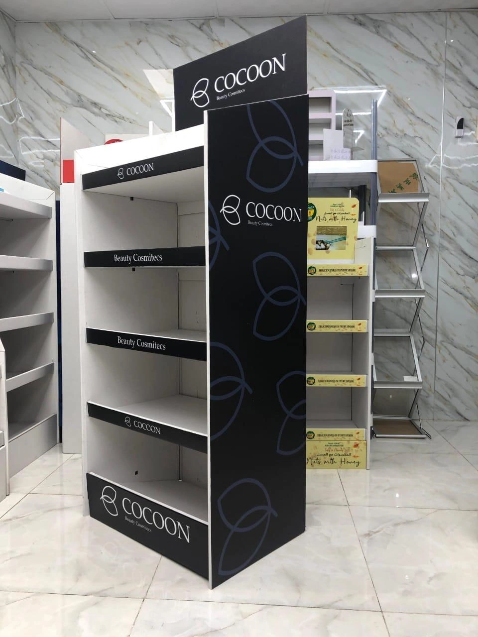 Custom display stand fabrication and branding for retail spaces in Dubai
