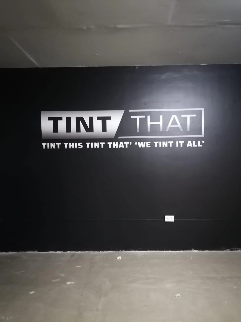 Custom wallpaper and showroom wall branding print in Dubai